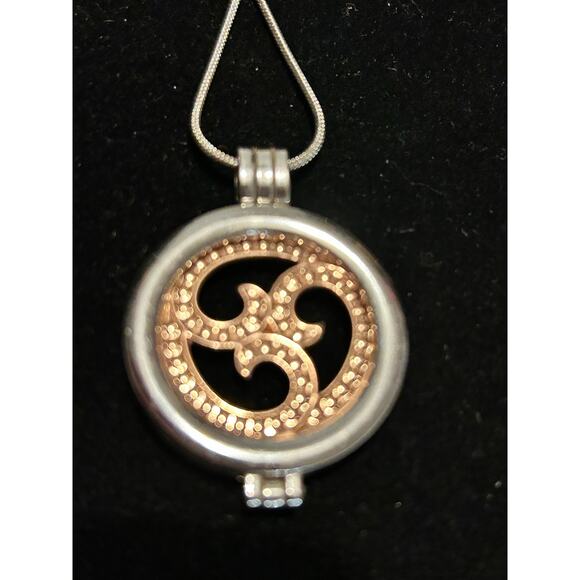 GANZ Jewelry - Ganz Stainless Steel Aroma Locket Necklace Spinning Om Symbol Rose Gold 31"